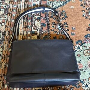 Unisex Coach messenger bag in gorgeous navy blue leather.
